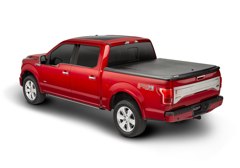 UnderCover 05-15 Toyota Tacoma 6ft SE Bed Cover Black Textured (Req Factory Deck Rails) UC4066