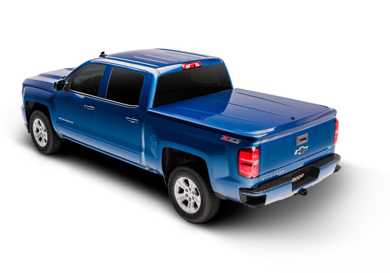 UnderCover 09-18 Ram 1500 (w/o Rambox) (19-20 Classic) 5.7ft Lux Bed Cover Flame Red UC3086L-PR4